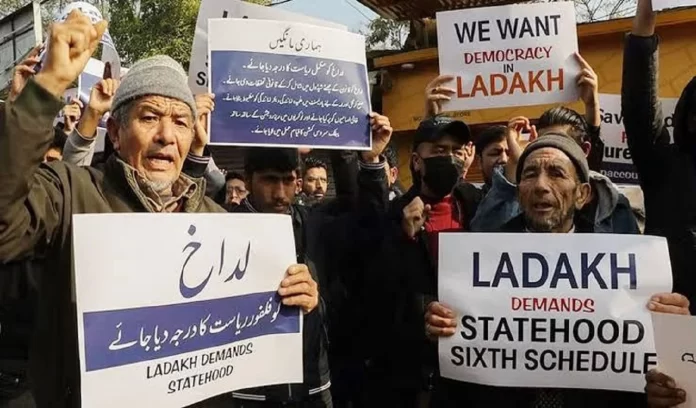 Why does Ladakh want to include itself in the Sixth Schedule of the Constitution?